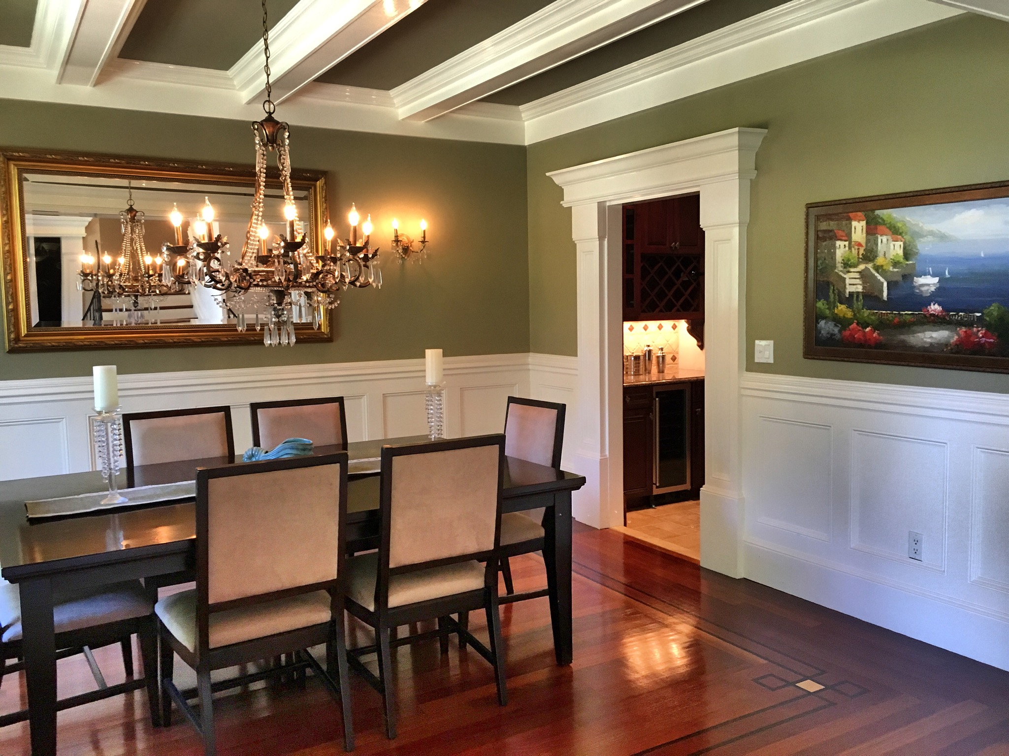 Dining room with coffered ceiling and wainscoting